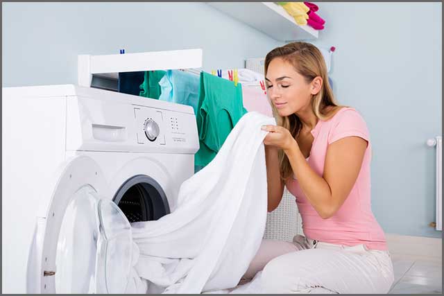 Woman satisfied with her laundry