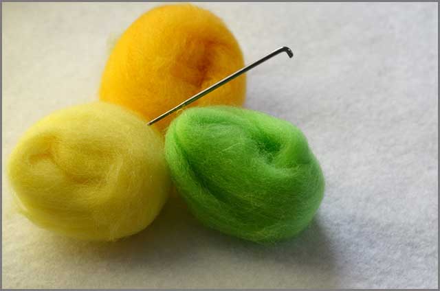 Roving wool and a felting needle