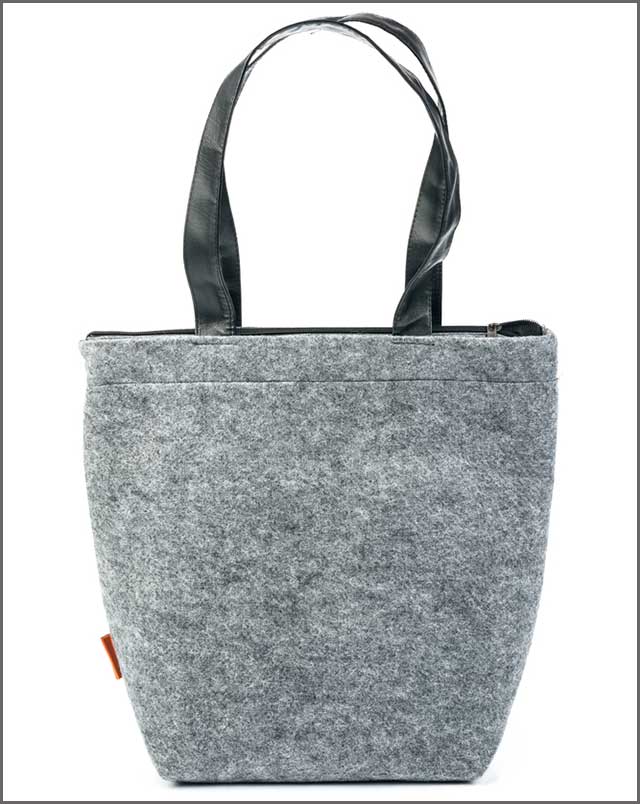 Side view of gray felt-fabric female bag