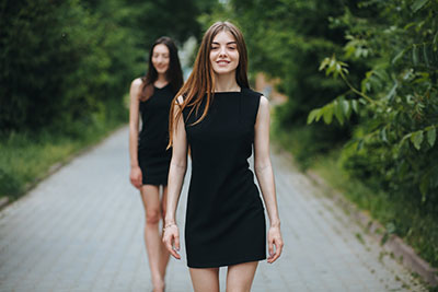 Girls wearing black dresses