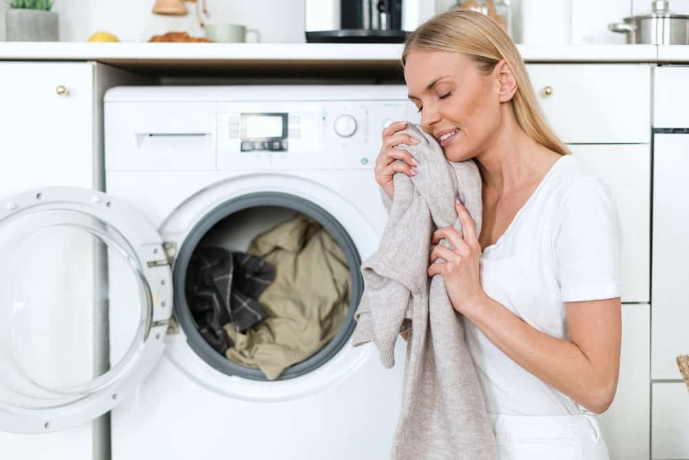 Woman holding soft clothes