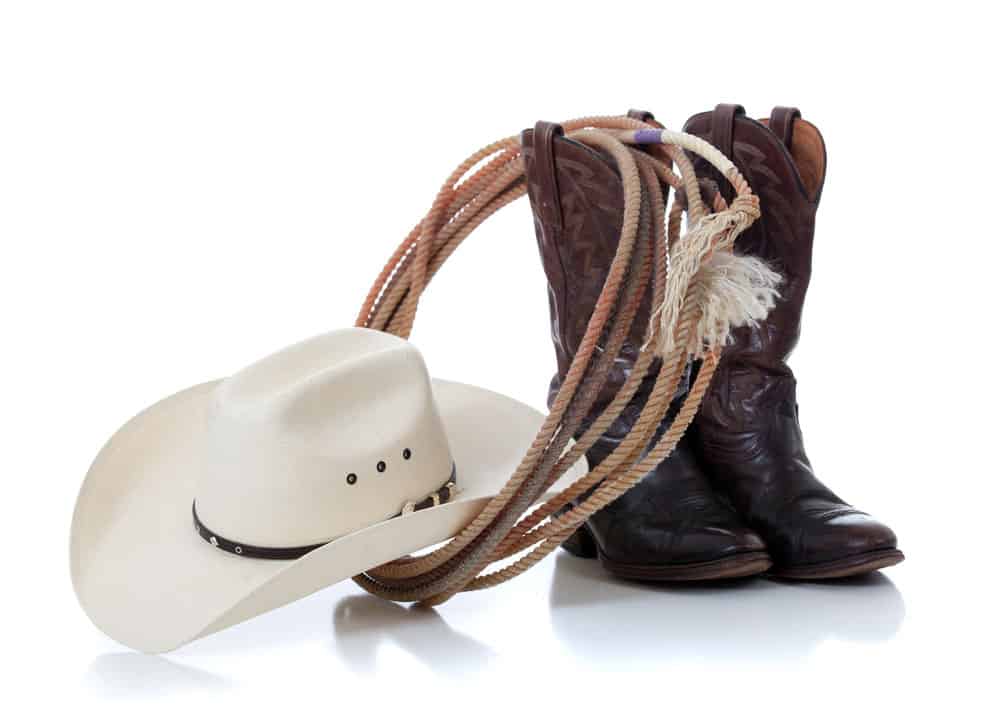 Cowboy hat, boots, and lariat