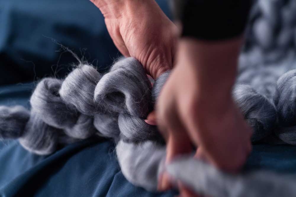 the process of knitting a blanket