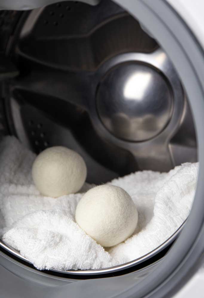 Dryer balls placed within a dryer